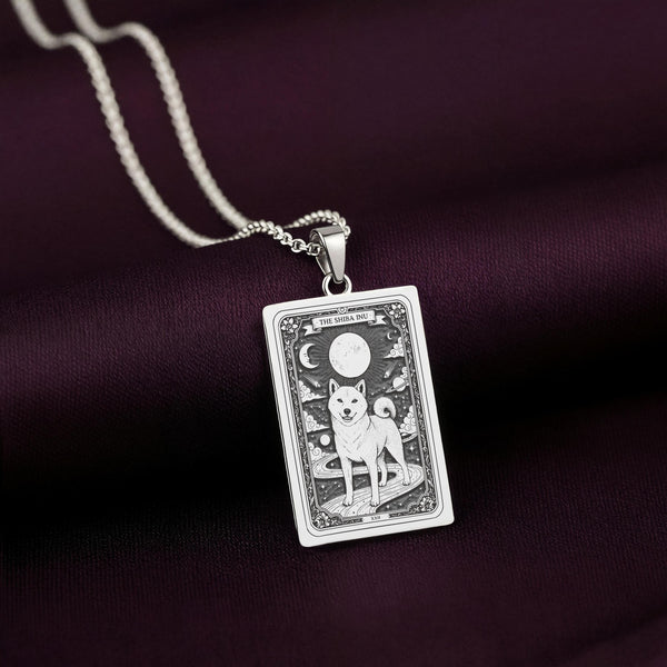 A striking 925 sterling silver Shiba Inu charm. The art shows the celestial dog, a meaningful piece of jewelry for a pet owner.