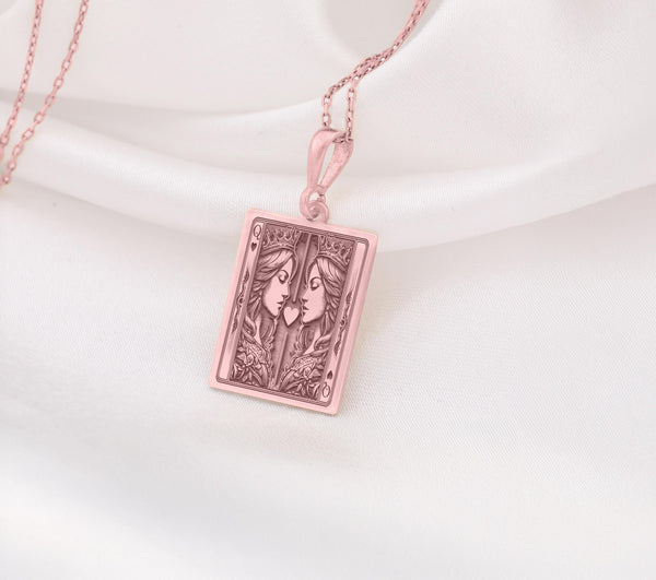 Rose gold Ace of Queens pendant showcasing two queens with crowns and a heart detail, celebrating sapphic love, unity, and empowerment. Elegant LGBTQ+ charm.