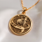 Aries Zodiac Necklace Pendants 14K 14K Gold Plated pendant necklace featuring a textured ram design on a circular disc.