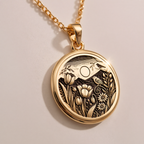 Botanical Nature Scene Medallion Pendant Pendants 14K 14K Gold Plated pendant necklace featuring a detailed floral wreath and bird design.