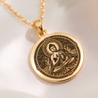 Meditating Buddha Mindfulness Pendant Necklaces 14K 14K Gold Plated pendant necklace featuring a seated spiritual figure design on a round disc.