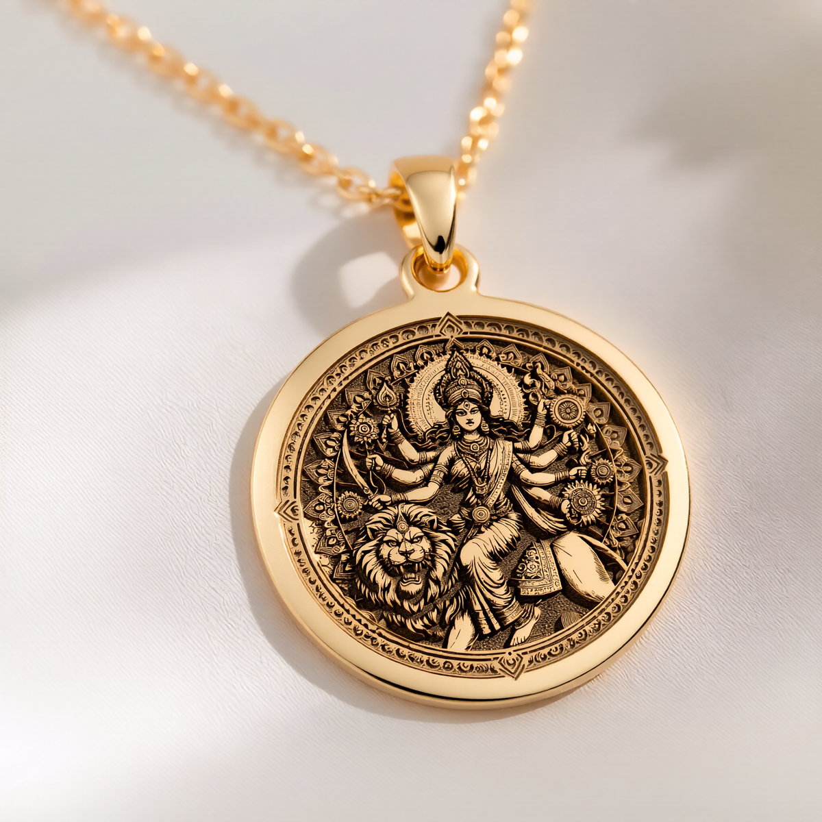 Durga Warrior Ten Arms Pendant Necklaces 14K 14K Gold Plated pendant necklace with an ornate circular medallion featuring a mythological figure and lion design.