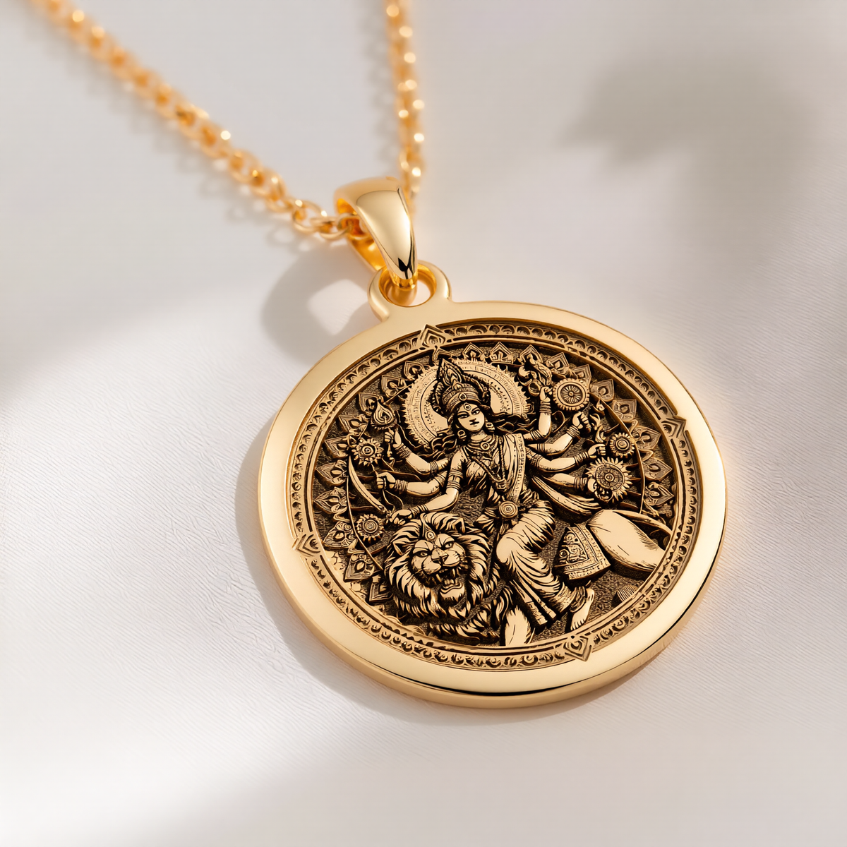 Durga Warrior Ten Arms Pendant Necklaces 14K 14K Gold Plated pendant necklace featuring an ornate mythological figure design with a lion in a circular frame.