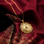 A personalized Ganesh Yantra necklace, a unisex spiritual amulet for couples, is shown being worn by both a man and a woman. This lifestyle photo highlights the versatility of this success and good luck talisman, making it a meaningful gift for partners on a shared spiritual journey. The sacred Elephant God charm is available in 14k gold, 925 sterling silver, and rose gold.
