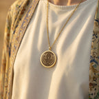 Garuda Bird Spiritual Amulet Necklace Necklaces 14K 14K Gold Plated pendant necklace featuring a circular heraldic eagle crest design.