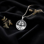 Gemini Zodiac Astrological Sign Necklace Necklaces 925 925 Sterling Silver pendant necklace featuring two intertwined female figures design on a round disc.