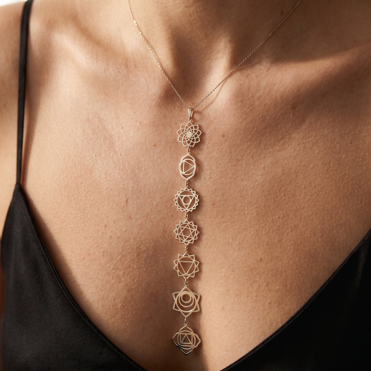 Solid 925 Sterling Silver 7 Chakras Drop Necklace on Model Decollete and Collarbone Macro