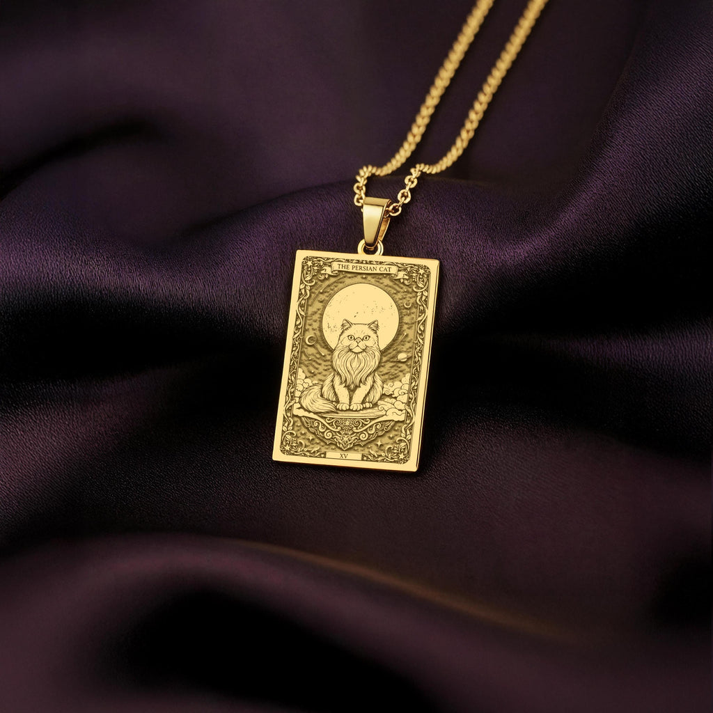 An heirloom-quality 14K solid gold Persian Cat tarot pendant. The art shows the regal cat on a cloud, symbolizing calm, a precious cat mom gift.