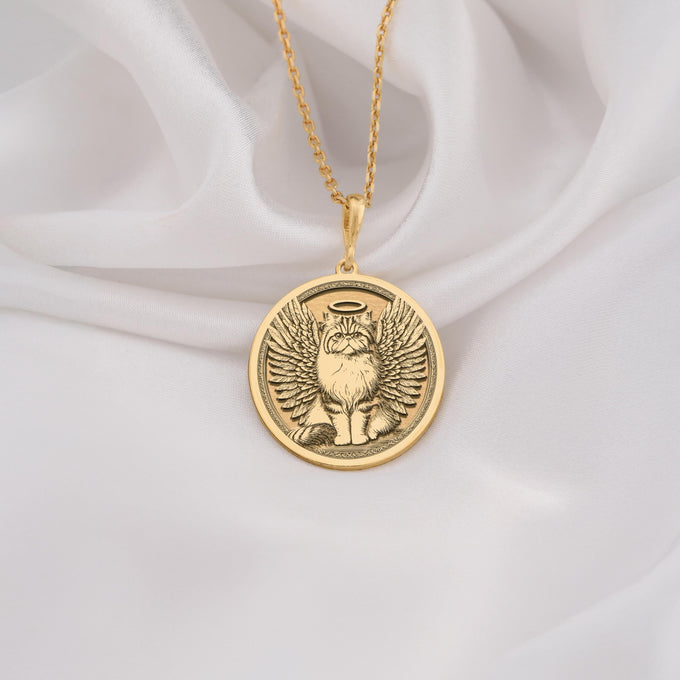 14K Solid Gold Persian Cat Angel Medallion featuring beloved long-haired breed with heavenly wings and halo. Detailed memorial talisman with fluffy coat, flat face and ornate decorative border. Luxury Persian cat memorial jewelry gift.