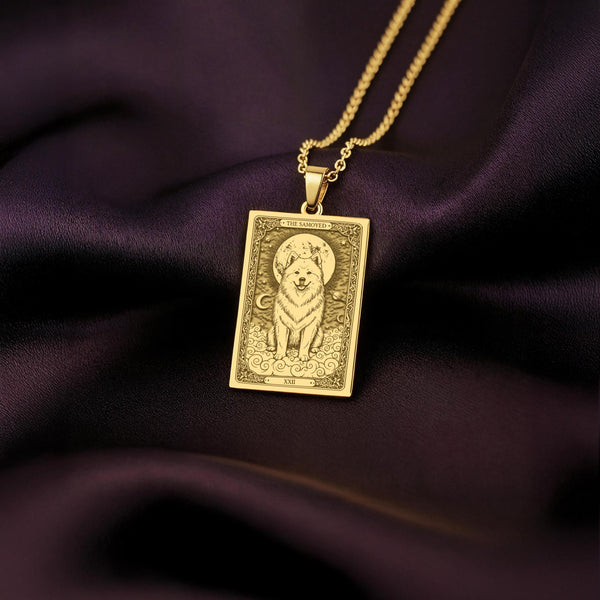 An heirloom-quality 14K solid gold Samoyed tarot pendant. The art shows the fluffy dog on a cloud, symbolizing its gentle spirit, a precious dog mom gift.