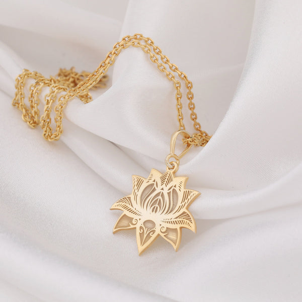 elegant 14K gold lotus necklace, symbolizing purity and enlightenment. Perfect for yoga lovers, spiritual seekers, or as a gift. Handmade with care, this minimalist gold pendant adds a touch of sophistication to any look. Ideal for special occasions.