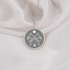Silver Egyptian Aker necklace with a double lion design. Handmade unisex mythology pendant symbolizing protection and inspired by ancient Egyptian art.