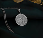 925 sterling silver Tutankhamun coin pendant, inspired by ancient Egyptian royalty. Lightweight and ideal for layering, this dainty amulet is a unique gift for lovers of history and elegance, blending minimalist design with resilience.
