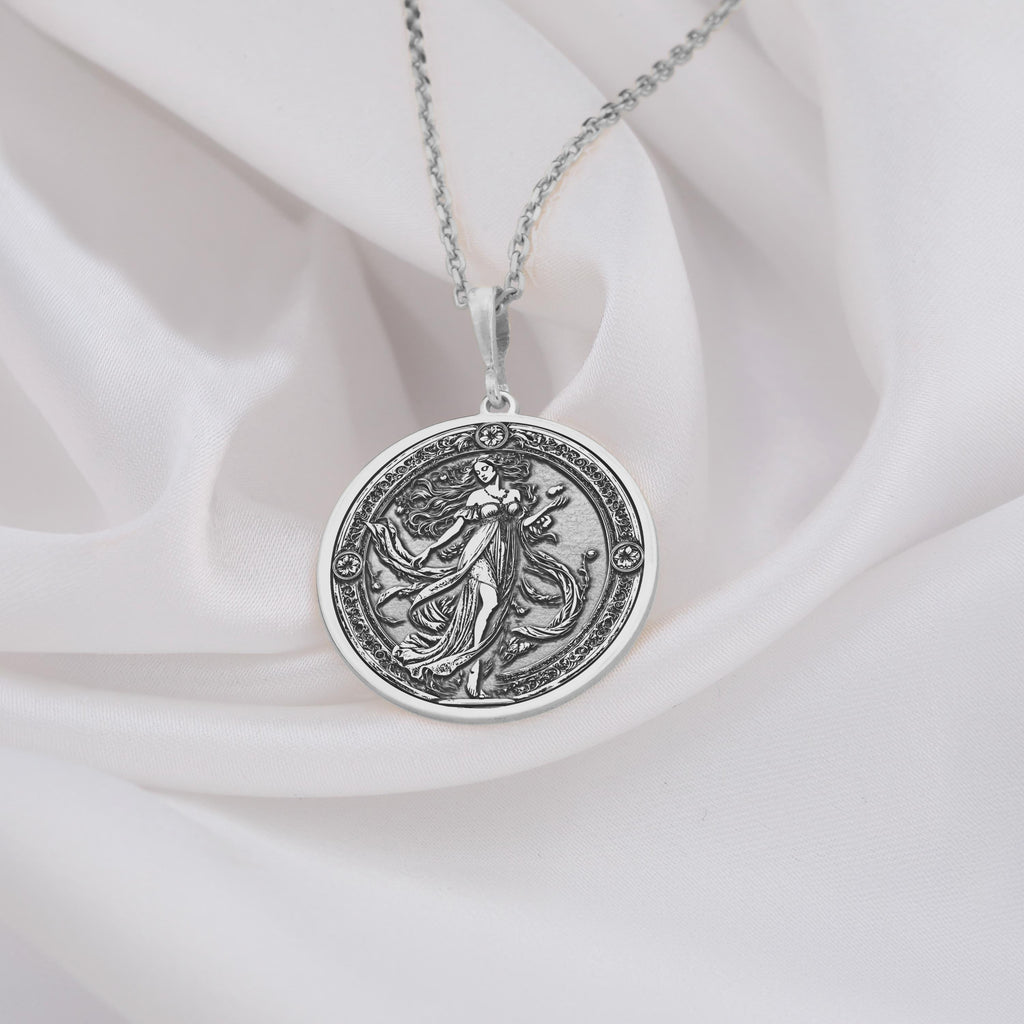 Persephone pendant necklace, mythology-inspired goddess amulet, and celestial talisman. Representing Persephone’s journey between light and shadow, this piece features a pomegranate charm symbolizing transformation, fate, and divine power. A perfect Greek goddess necklace for witchy aesthetics, spiritual jewelry lovers, and celestial fashion enthusiasts.
