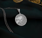 925 sterling silver Celtic raven necklace pendant, symbolizing resilience and mystery. Lightweight and ideal for layering, this charm is a unique gift for those drawn to ancient wisdom. Handcrafted and timeless, suited for everyday wear.