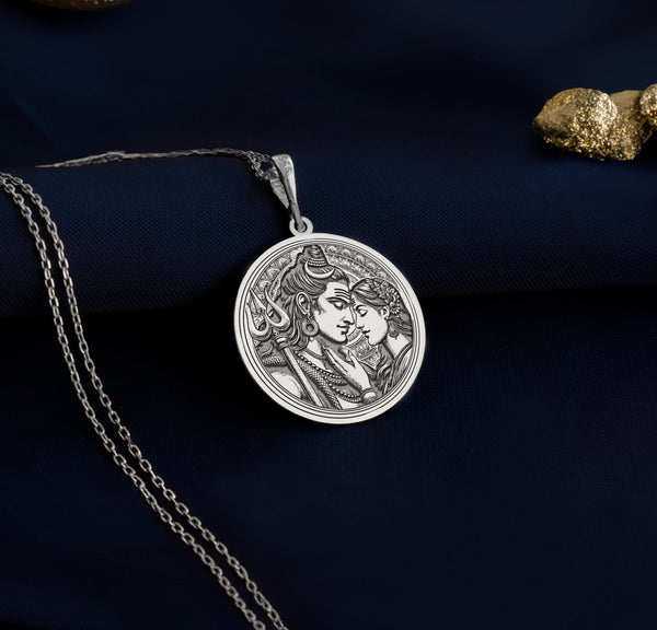 silver lord Shiva and Goddess Parvati pendant necklace, in a loving embrace. The design showcases divine symbols like Shiva s trident and their serene expressions, symbolizing the eternal bond of love and spirituality in Hindu mythology