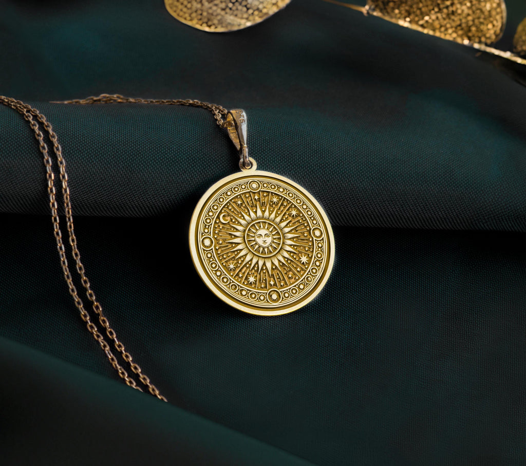 Gold plated sun pendant necklace with a celestial sunburst design, perfect for layering, boho style lovers, and unique gift ideas.