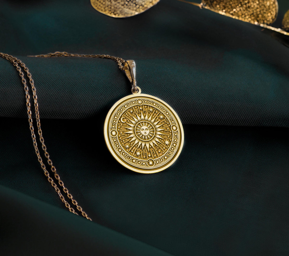 Gold plated sun pendant necklace with a celestial sunburst design, perfect for layering, boho style lovers, and unique gift ideas.