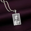 A handcrafted 925 sterling silver sly fox charm in a rectangular shape. This personalized piece of anthropomorphic jewelry is a standout accessory for an admirer of the trickster archetype.