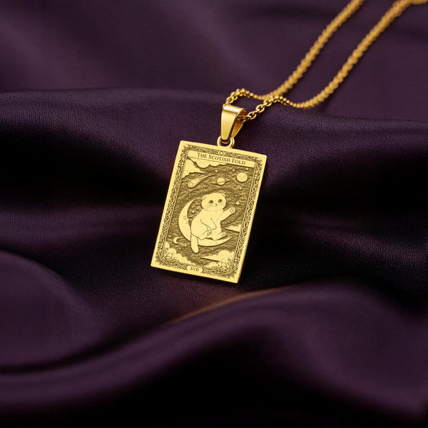 A polished 14K solid gold Scottish Fold medallion. This fine pet jewelry represents the breed's sweet spirit, making it a perfect cat lover gift.