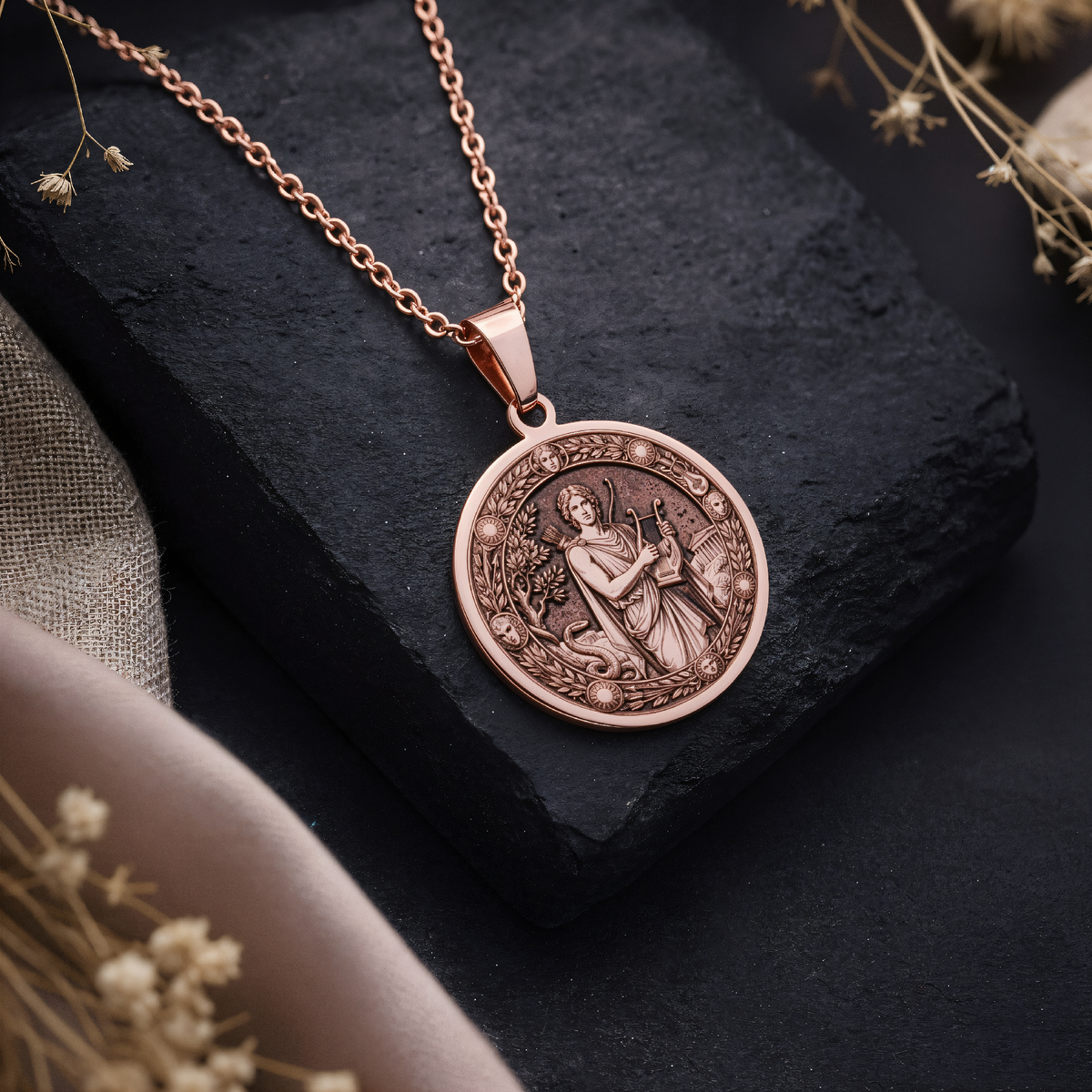 Apollo God of Sun Music Pendant in a polished rose gold finish.