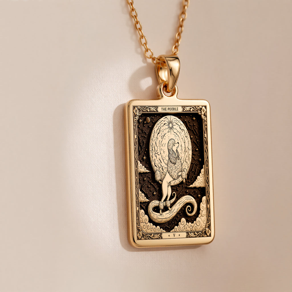 An heirloom-quality 14K solid gold Poodle tarot pendant. The art nouveau design symbolizes elegance, a precious dog mom gift.