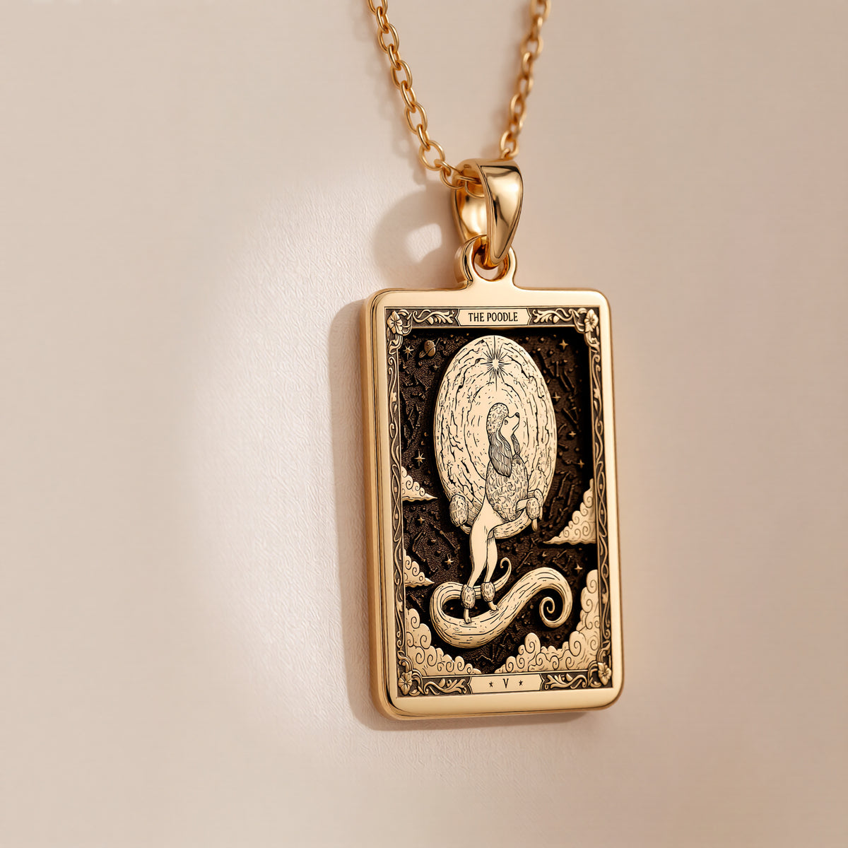 An heirloom-quality 14K solid gold Poodle tarot pendant. The art nouveau design symbolizes elegance, a precious dog mom gift.