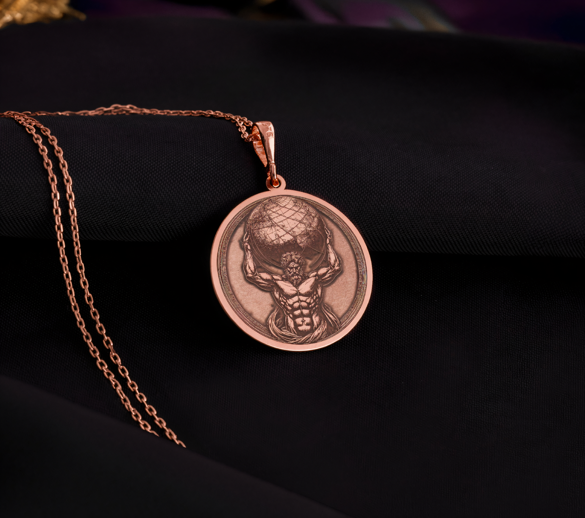 Atlas Titan Pendant in a polished rose gold finish.
