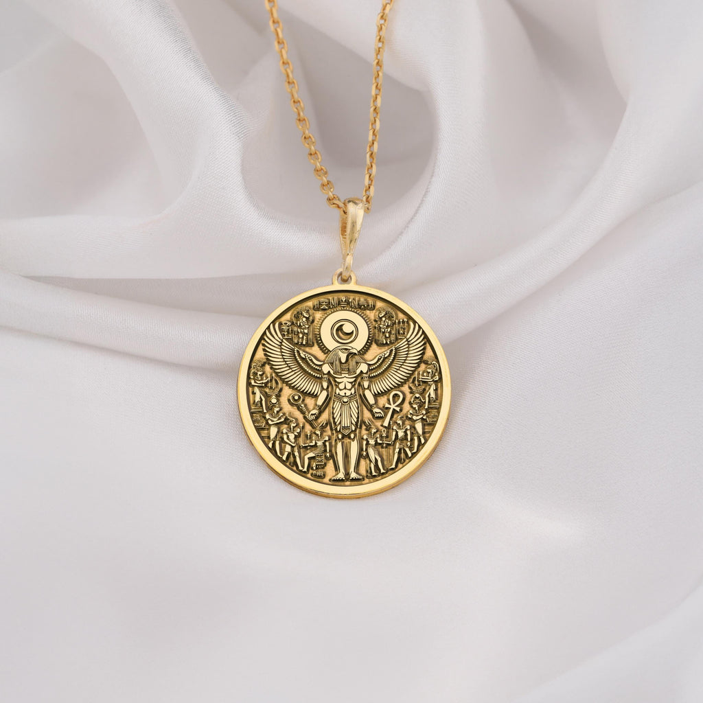 RA Necklace crafted in 14K Solid Gold, featuring an intricate Egyptian winged design. A luxury talisman pendant, perfect for mythology enthusiasts and statement jewelry lovers. Elegant and timeless ancient-inspired accessory.