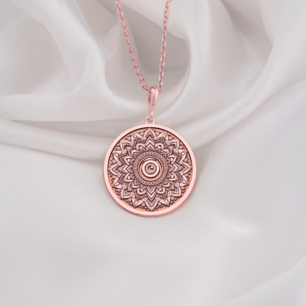 Rose Gold Plated Sacred Mandala Evil Eye Medallion featuring intricate lotus petals with protective evil eye center and spiritual symbolism. Elegant protection jewelry with detailed mandala design. Warm-toned spiritual talisman.