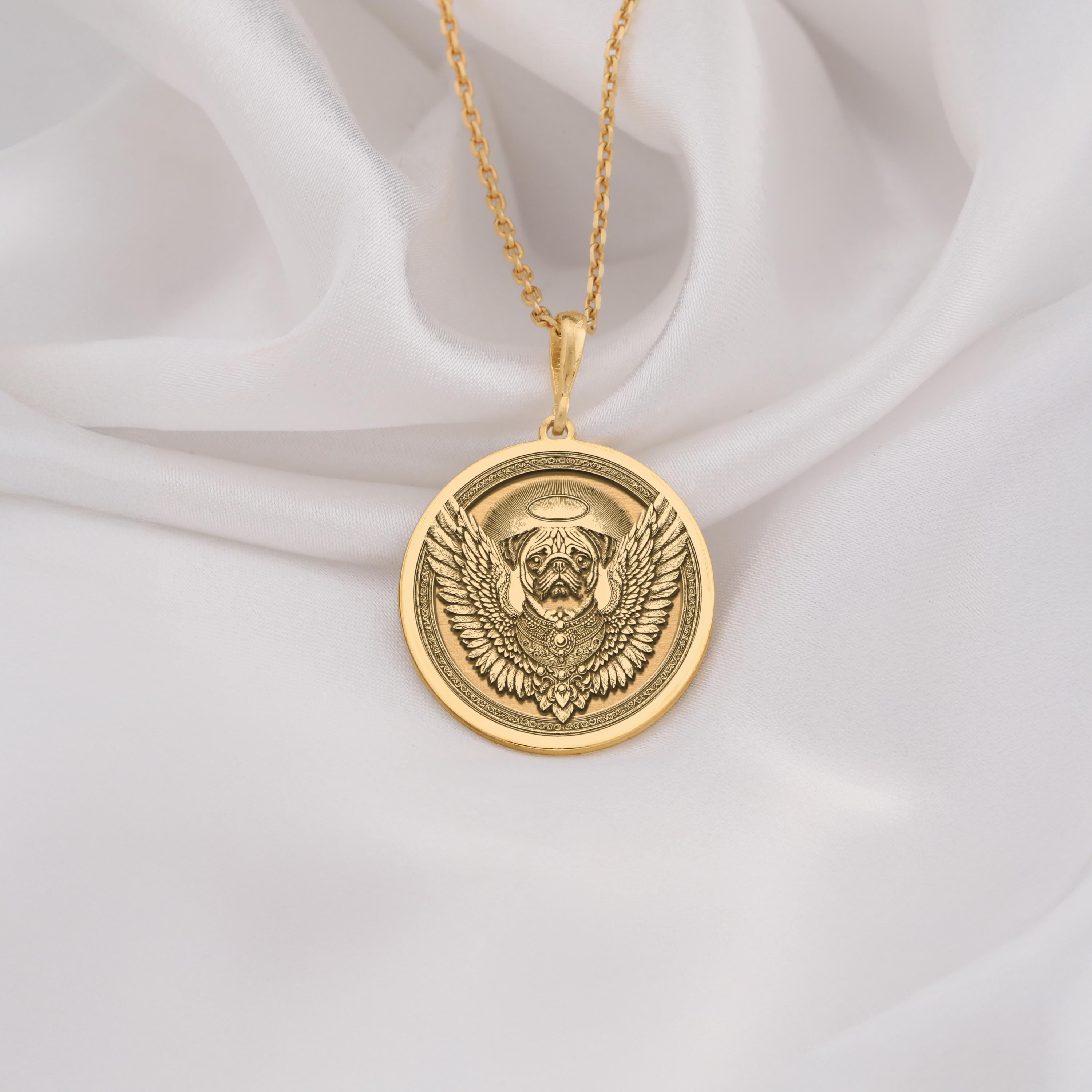 14K Solid Gold Pug Angel Dog Medallion featuring beloved small breed with heavenly wings and halo. Detailed memorial talisman with characteristic wrinkled face, compact body and ornate decorative border. Luxury Pug memorial jewelry gift.