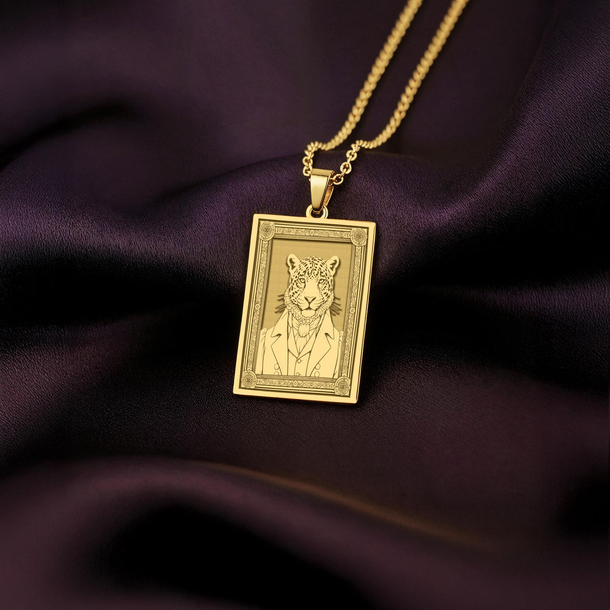 An heirloom quality 14K solid gold rectangular pendant engraved with a majestic jaguar. This fine jewelry piece from the Fable Character collection is inspired by Mesoamerican mythology.