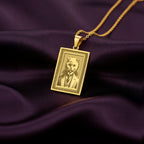 Product photo of a 14K Solid Gold Scottish Fold necklace from the 'Victorian Pet Collection'. The engraved cat is portrayed as a dapper gentleman in a suit and tie.