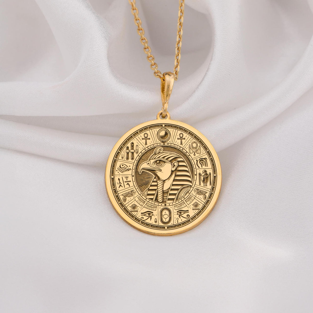 Eye of Horus Protection Amulet Necklace Necklaces 14K 14K Gold Plated pendant necklace featuring an Egyptian style stylized head design on a round disc.