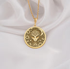 Mystical 14K gold alien pendant, featuring a detailed extraterrestrial medallion with floral cosmic engravings. A stunning sci-fi jewelry piece, perfect for space lovers, making it a unique gold cosmic charm.