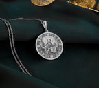 Sterling Silver Saint Dionysius Areopagite Pendant with detailed Orthodox design. Handcrafted silver coin charm featuring Christian saint with holy book and sacred elements. Religious jewelry celebrating Orthodox faith and divine guidance.