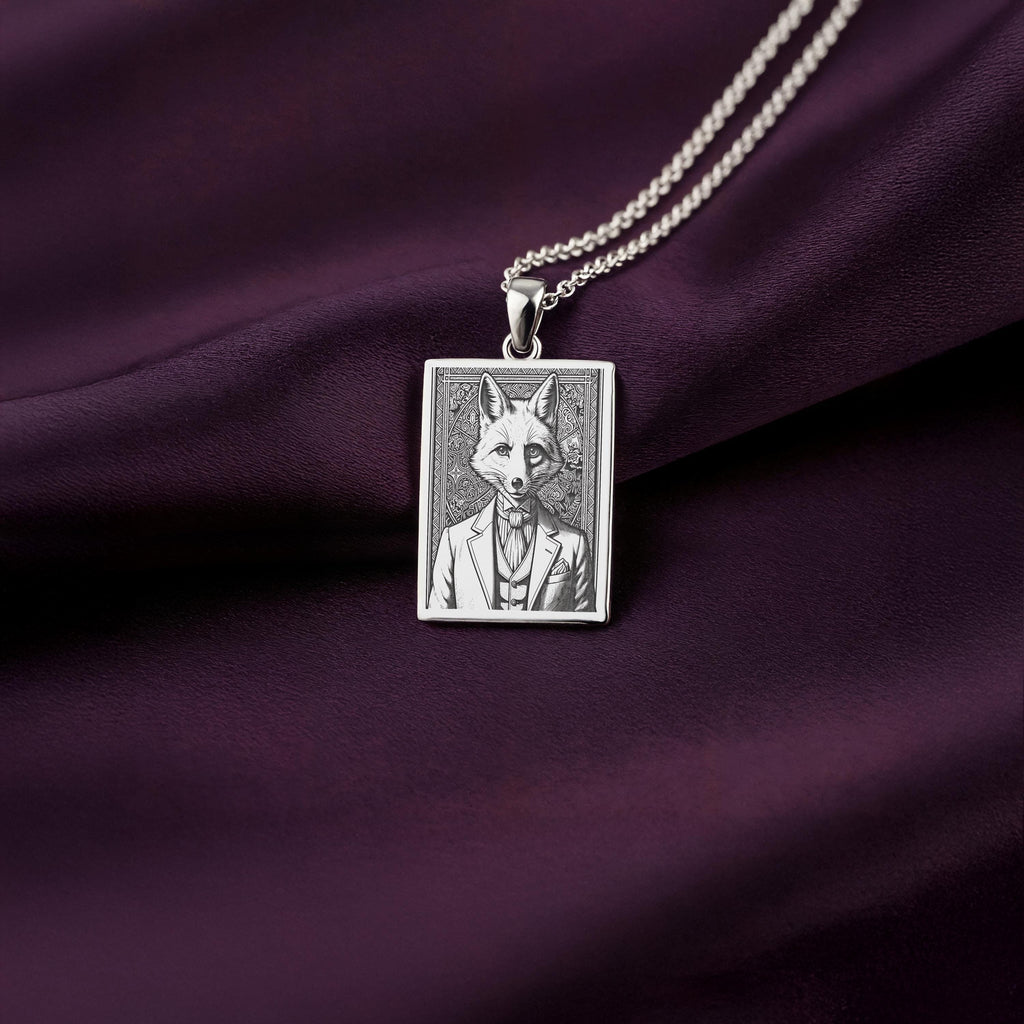 A striking 925 sterling silver tarot card pendant of a Victorian fox. This piece of whimsical jewelry is inspired by literary characters like Reynard the Fox.