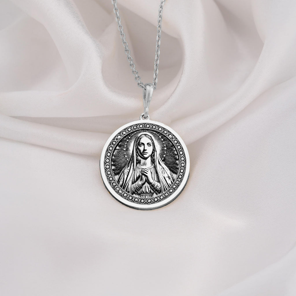 925 Sterling Silver Medjugorje necklace with Queen of Peace engraving. A classic silver spiritual Mary pendant for devotion and hope.