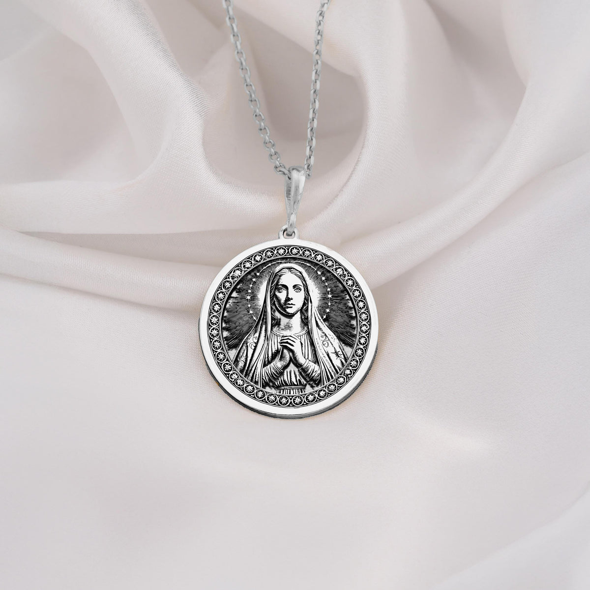 925 Sterling Silver Medjugorje necklace with Queen of Peace engraving. A classic silver spiritual Mary pendant for devotion and hope.