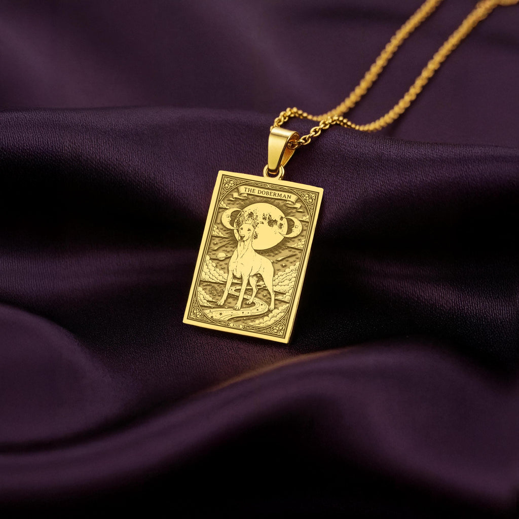 A polished 14K solid gold Doberman medallion. This fine pet jewelry represents the breed's noble spirit, making it a perfect Doberman lover gift.