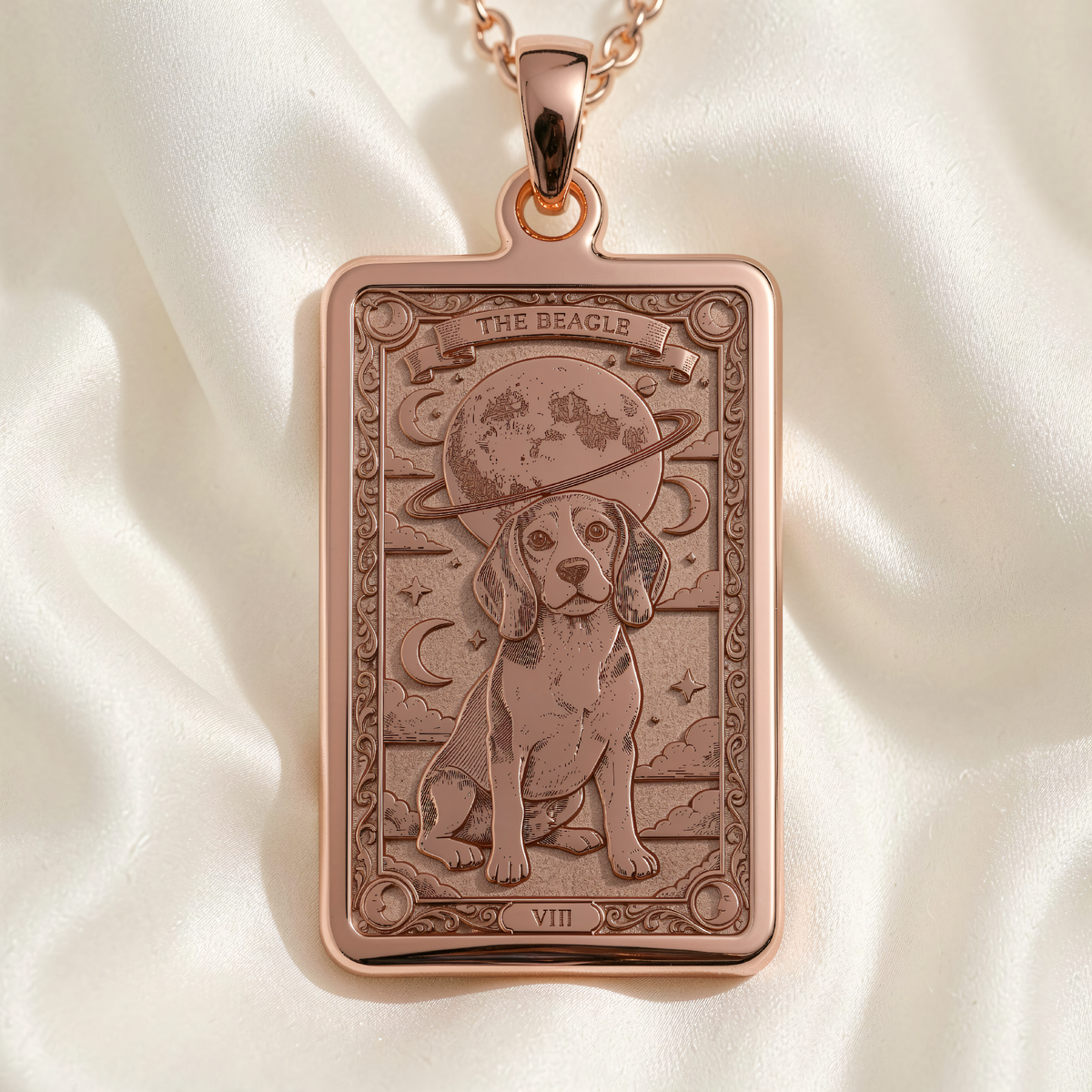 Rose gold plated Beagle Tarot medallion, front view: sitting beagle beneath moon and rings above Roman numeral VIII.