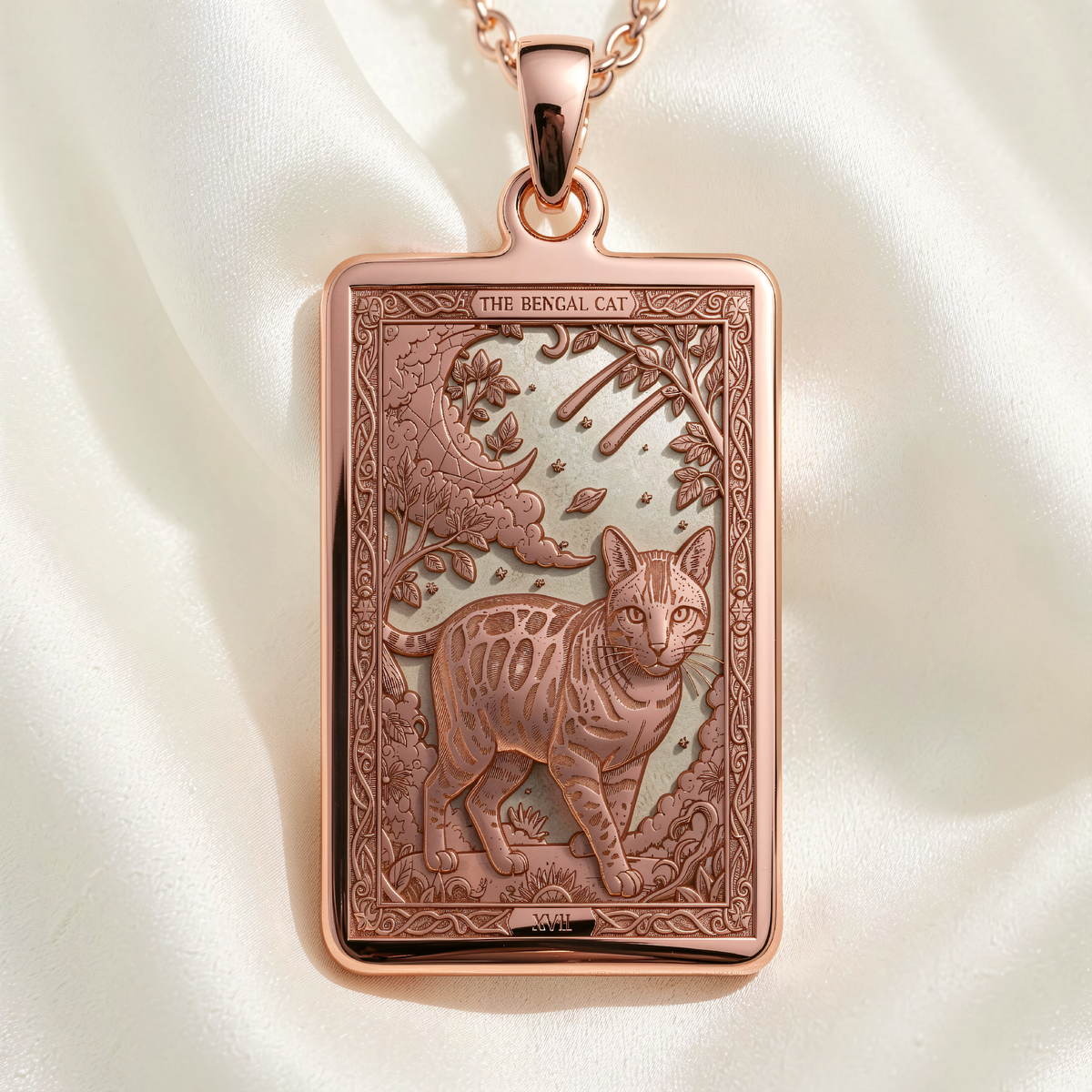 The Bengal Cat tarot-style pendant in rose gold plated metal showing front view of engraved feline under crescent moon
