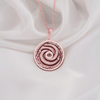 Rose Gold Plated Ouroboros Pendant with a beautiful snake motif representing renewal and infinite cycles. A perfect balance of elegance and symbolism for modern jewelry lovers.