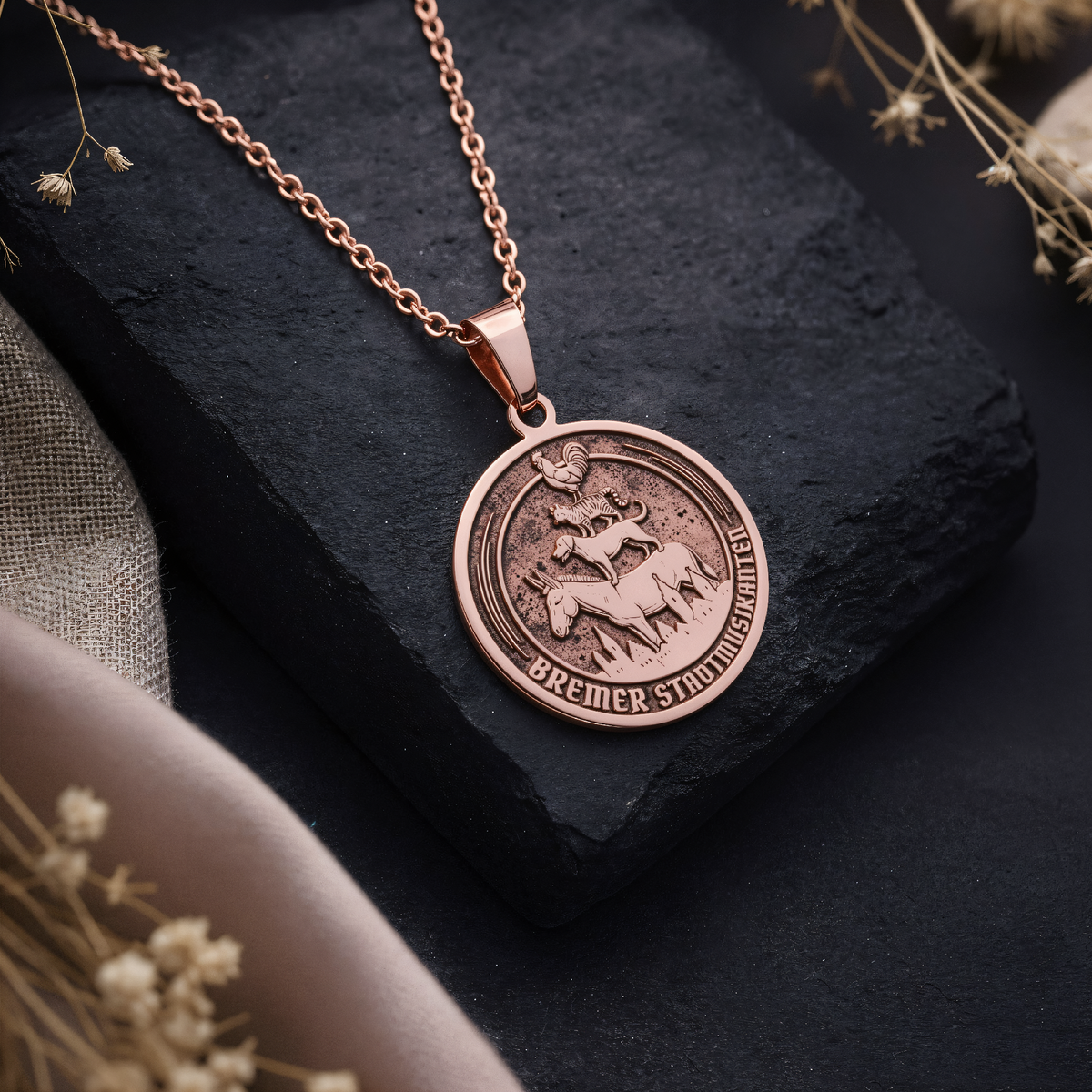 Bremen Musicians Grimm Fairy Tale Pendant in a polished rose gold finish.