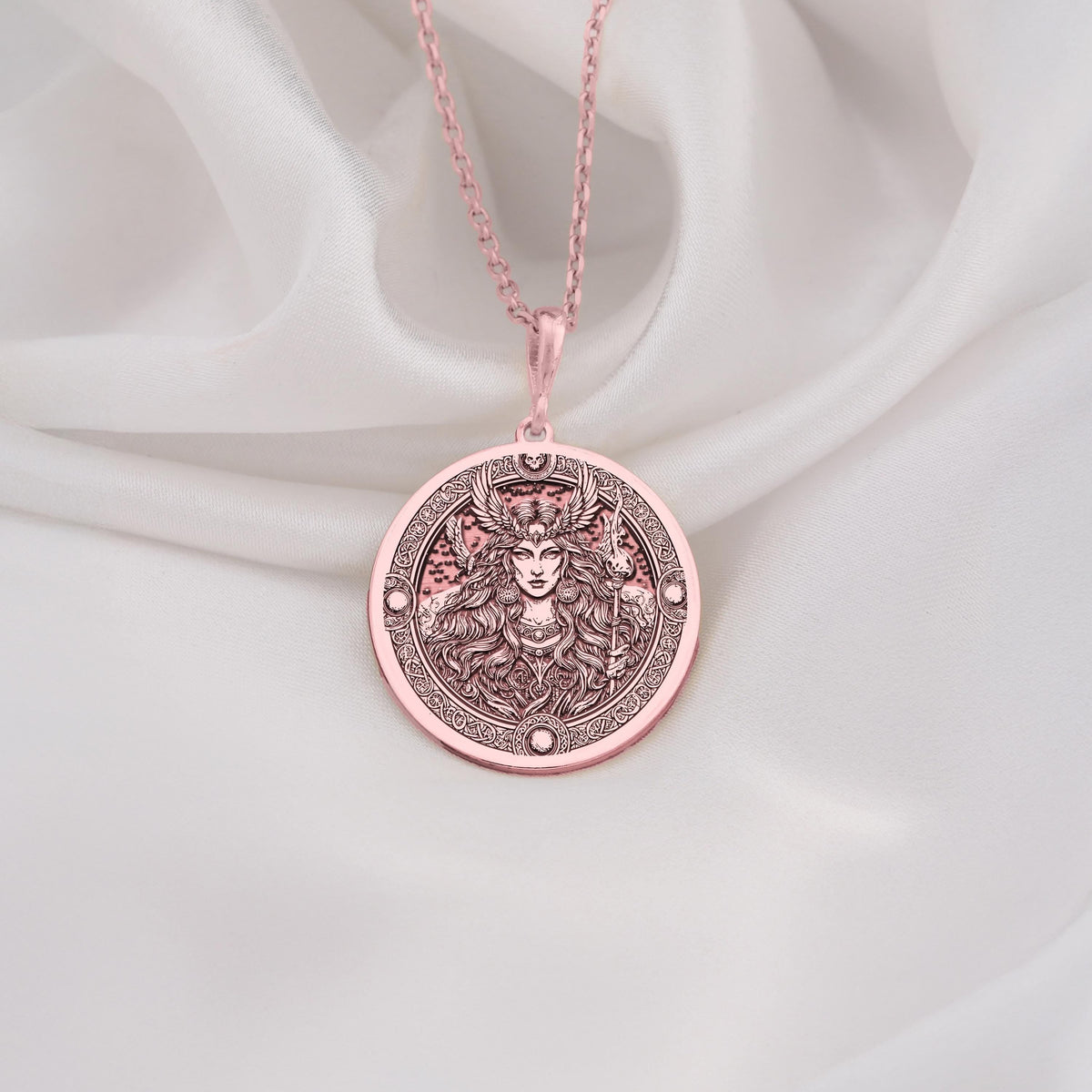 Rose Gold Plated Freya Norse Goddess Medallion featuring Viking deity with winged headdress and flowing hair. Elegant pagan jewelry with detailed mystical elements and ornate border. Warm-toned Norse talisman, perfect gift for mythology enthusiasts.