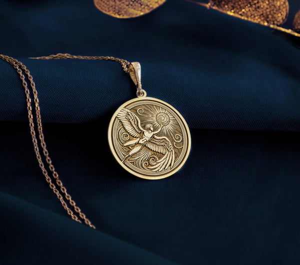 14K Gold Plated Icarus necklace, engraved with a soaring figure reaching for the sun. This gold-plated Greek mythology pendant represents determination, power, and limitless potential.