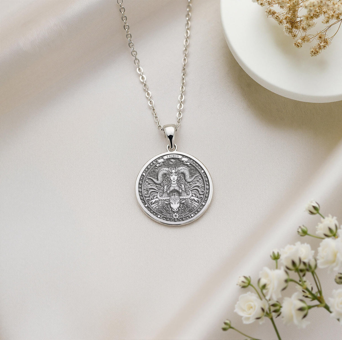 A personalized 925 sterling silver Taurus necklace. This gift for her symbolizes a grounded spirit, a cherished keepsake.