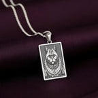 925 Sterling Silver version of The Ancestors Collection's British Shorthair necklace, with a cool tone contrasting against the rich purple fabric.