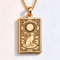 Cat Paw Print Pendant Necklace - Tarot Charm in a gold finish, shown from the front with detailed engraving on the pendant.