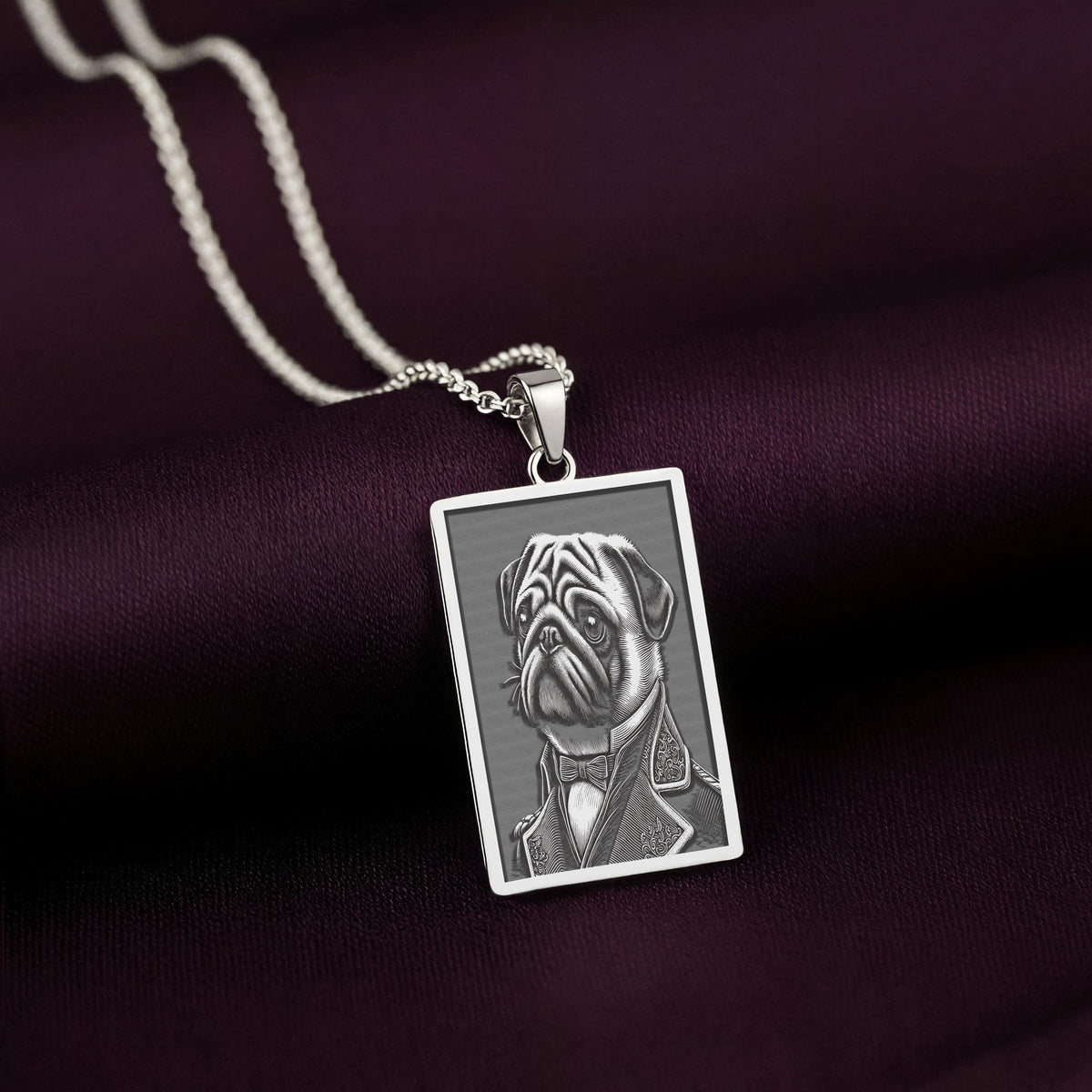 A polished 925 sterling silver rectangle pendant with a custom laser-etched portrait of a Pug in formal wear, ideal as a unique dog lover gift.